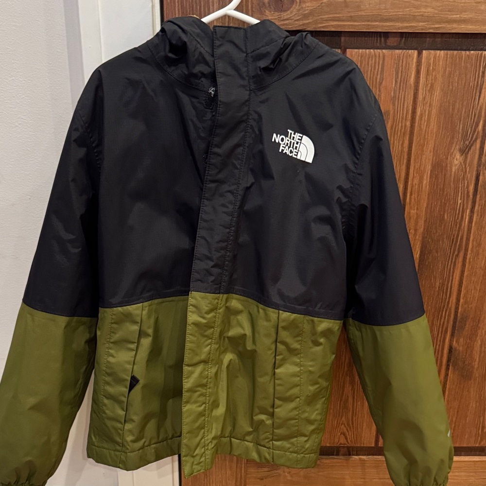 The North Face Kids' Black and Olive Raincoat with fleece lining.